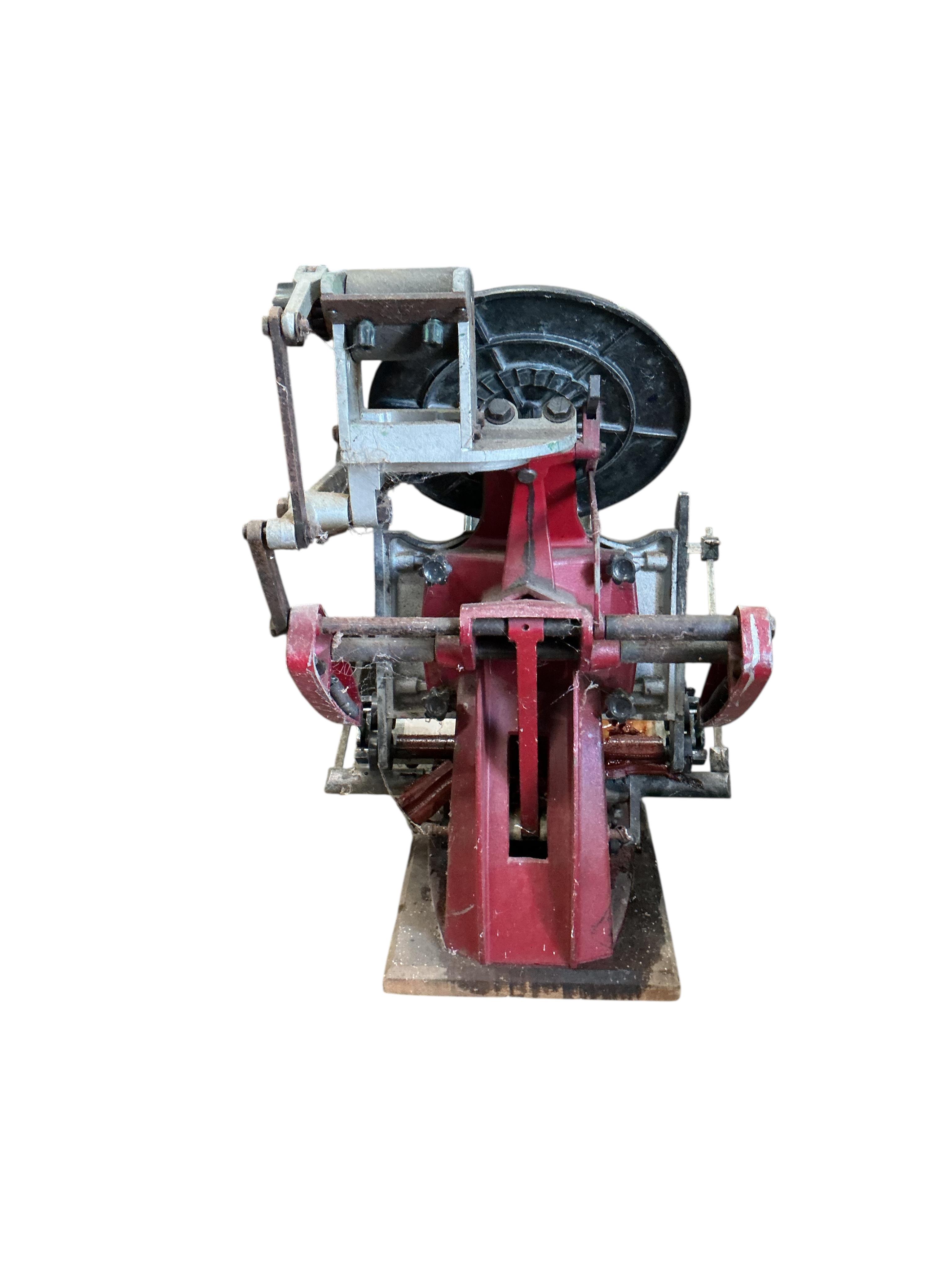 An Adana eight-five printing press with a large quantity of assorted type face, trays, accessories etc.